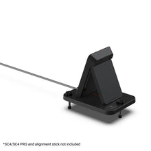 Load image into Gallery viewer, Rear view angle of the SC4 Pro on top of the alignment stand on a white background